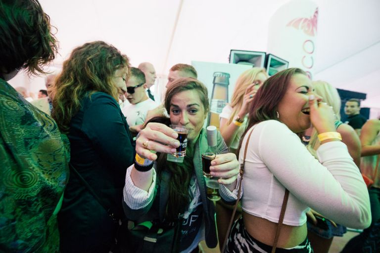 sandbanks beach polo girl with drinks